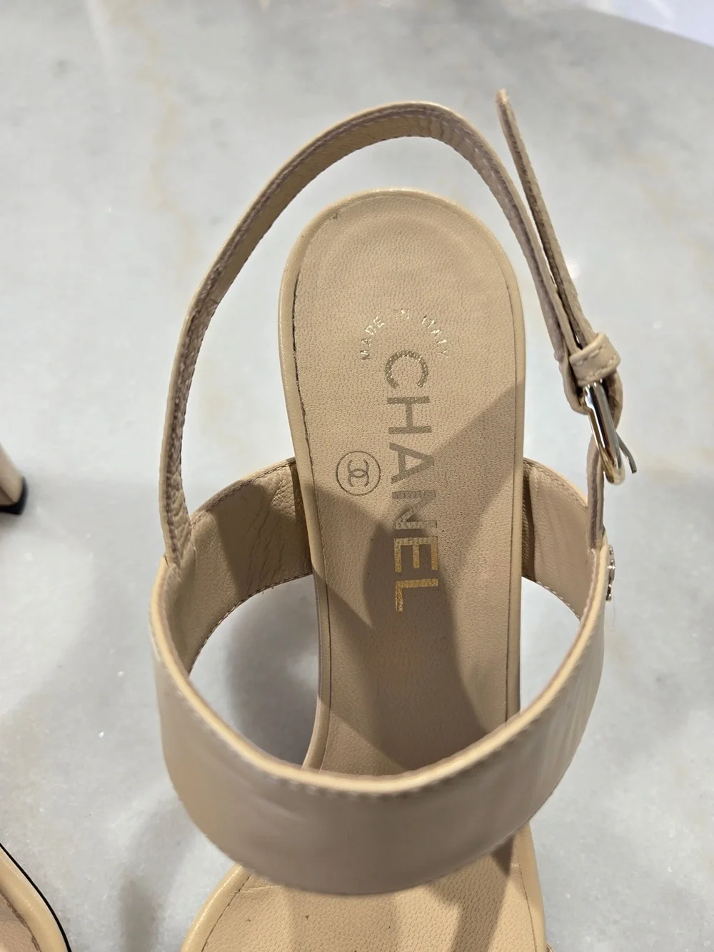 CHANEL Beige Slingback Heels with Black-and-Gold Chain